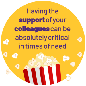 yellow roundel with popcorn box at the bottom edge with the wording 'having the support of your colleagues can be absolutely critical in times of need.'